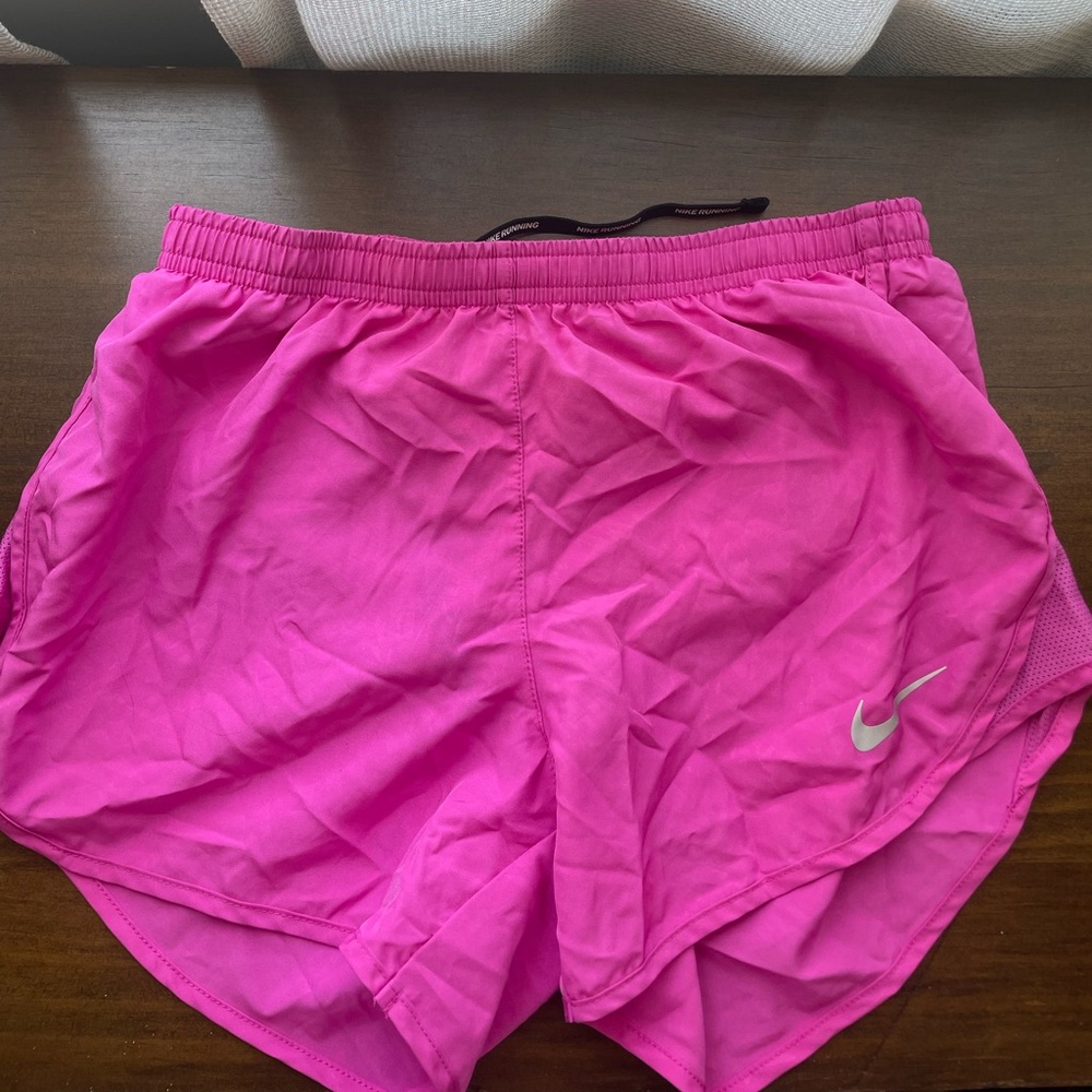 NIKE pink dri-fit running shorts with elastic waist band lightly worn